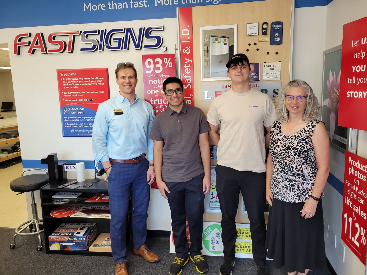 Scott Cook, Chamber CEO; Aditya Bhushan, Niwot High School; Jamie Williams, FastSigns Longmont; Kathy Stevens, Chamber.